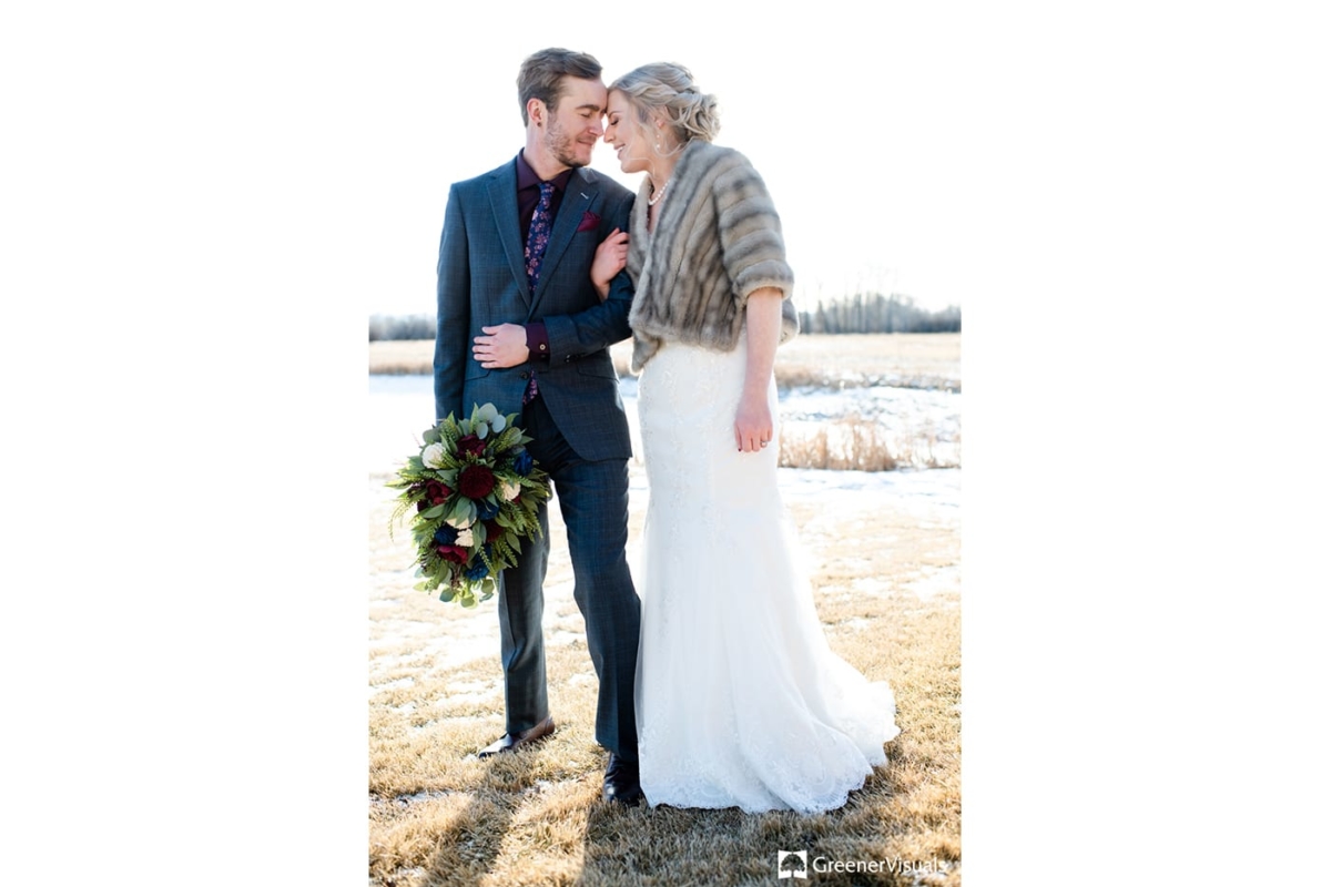 Bride Groom Embrace Gallatin River Lodge Winter Wedding